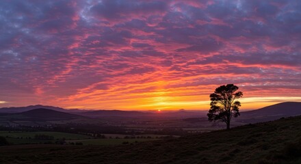 Fototapeta premium Sunrise over rolling hills