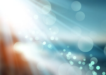 Defocussed beach landscape with sunrays and bokeh lights design 