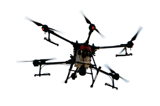 Agricultural technology smart farm concept. Farmer technicians remotely fly agricultural drones to fly to spray fertilizer in fields.