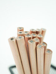 Close-up of pencils ready for writing, drawing, and creative projects with a clean background