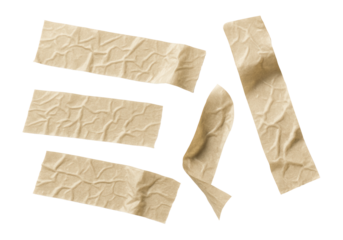 Five crumpled strips of beige adhesive tape arranged randomly on transparent background.
