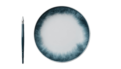 Round dinner plate,  teal-blue ombre design,  with a  silver rim, and a matching dinner knife