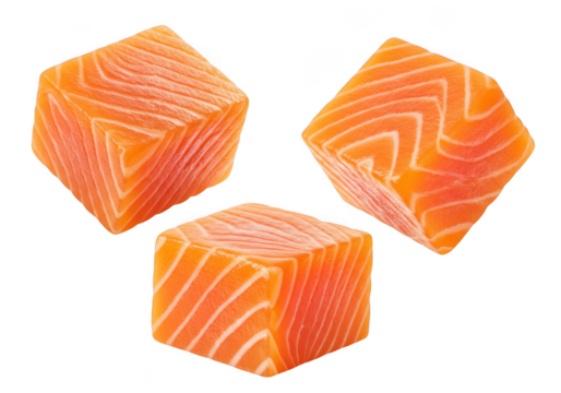 Three cubes of raw salmon fish isolated on transparent background