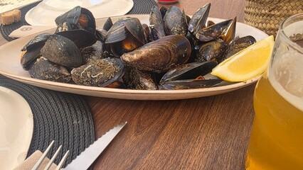 steamed mussels with lemon, galician seafood © carballo