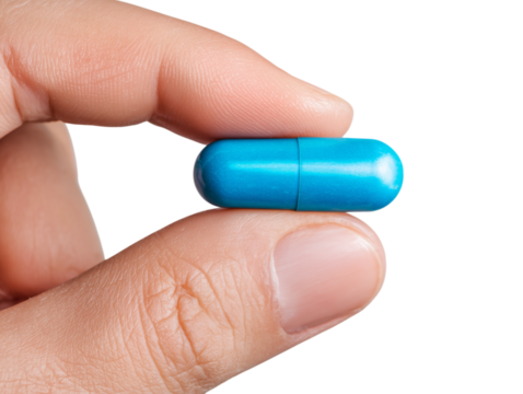 A close-up image of a blue capsule held delicately between fingers