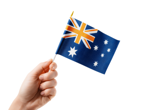 A person's hand proudly holds the flag of Australia, showcasing its iconic Southern Cross and Union Jack elements, signifying patriotism, national pride.