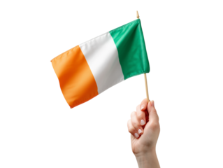 A hand proudly holds aloft the vibrant tricolor flag of Ireland