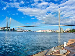 Vladivostok, Russia, August, 04, 2025. Vladivostok. The Golden Bridge is a cable—stayed bridge across the Golden Horn Bay from the Tsesarevich Embankment in August 2025