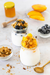 Plant-Based Gluten-Free Breakfast Options with Coconut Yogurt, Fresh Fruit, and Homemade Muesli