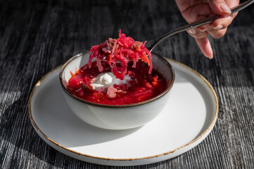 A bowl of borscht soup in a cafe. 