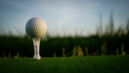 Golf Ball on Tee Ready for Perfect Swing at Sunset in Nature