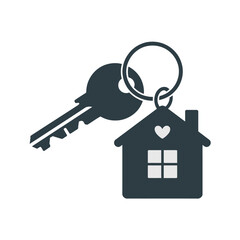 House key with heart shaped house keychain isolated on white background