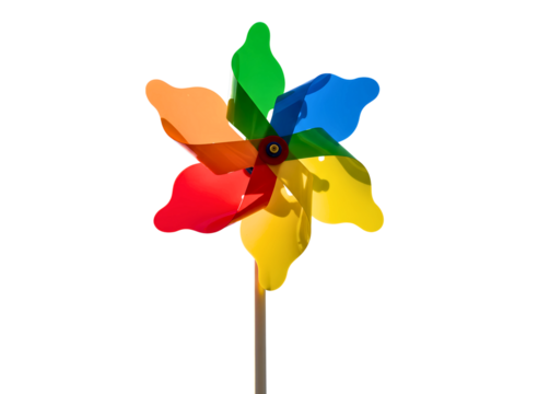 Colorful pinwheel toy with red blue and yellow petals isolated on transparent background