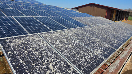 dirty and cleaned solar panels	