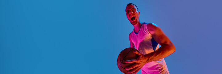 Dynamic athlete holding basketball against bright gradient background. Concept of strength flex,...