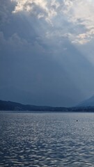 Dramatic thunderstorm sky over the lake — nature’s raw energy above still waters
