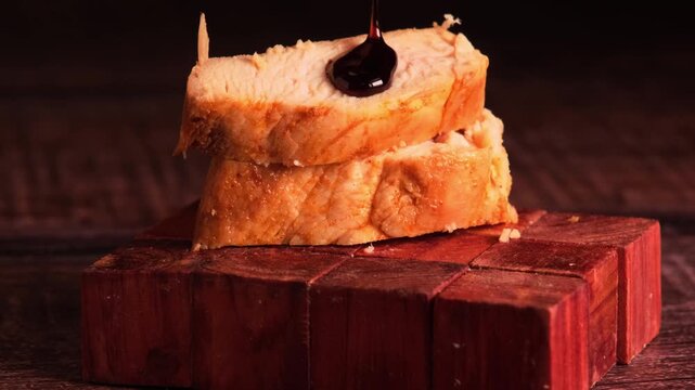 Piece of chicken cut into portions seasoned with soy sauce.