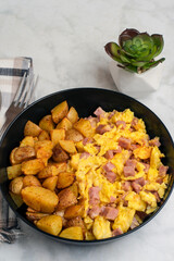 scramble eggs  with diced spam