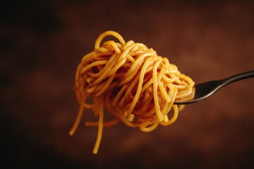 Spaghetti with tomato sauce on a fork