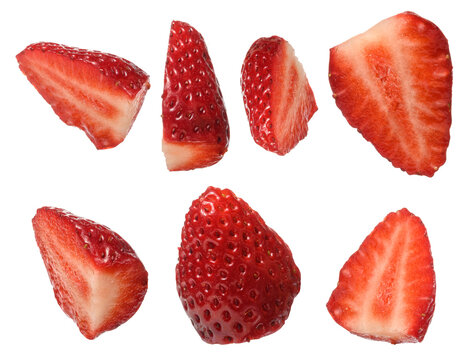 Collage of ripe strawberry pieces, isolated background. Halves and quarters showing red flesh and seeds