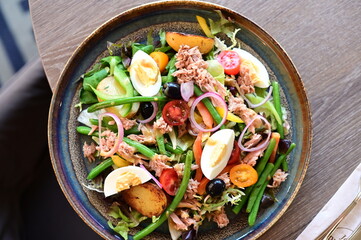 Fresh Vegetable Salad with Tuna, Olives and Egg – Restaurant Presentation