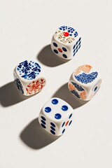 Four decorative dice,  white background,  ornamental designs