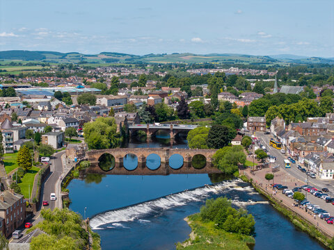 Aerial view of River Nith and weir, various bridges, Dumfries, Scotland