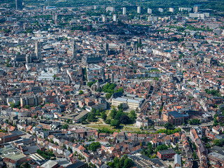 Industrial zone with wind turbines, nuclear power plants and Oil refinery on shipping port with highway in background - The Causes and solutions of Clim ate Change and Global Warming	