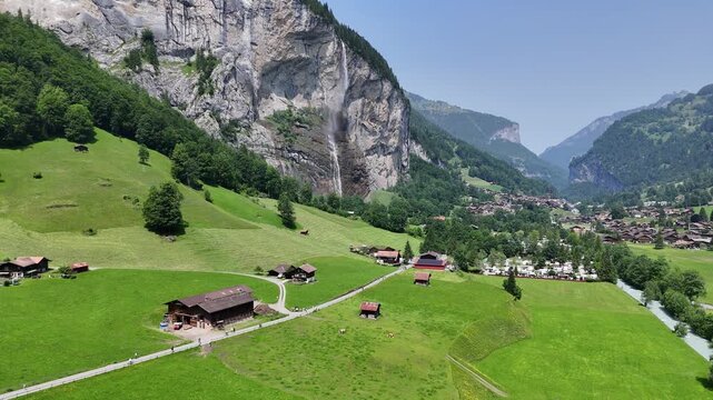 Lauterbrunnen green Valley Switzerland ascending drone,aerial