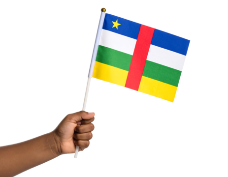 A hand holds the national flag of the Central African Republic, with its four horizontal and one vertical stripe.