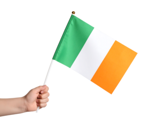 A hand holds the national flag of Ireland, featuring vertical stripes of green, white, and orange.