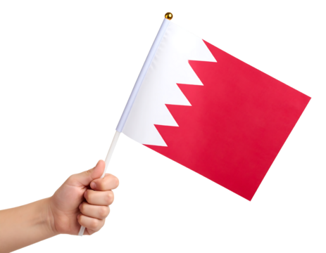 A hand holds the national flag of Bahrain, a symbol of the country's national identity.