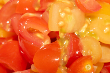 Close up of fresh finely chopped tomatoes red and yellow