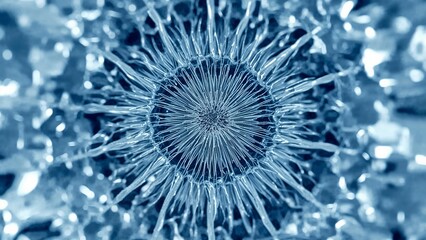 A close up view of a blue spiky abstract design with a central circular pattern and radial lines