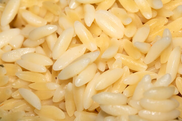 Close up of orzo pasta rice shaped carbs tasty cooked