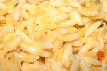 Close up of orzo pasta rice shaped carbs tasty cooked
