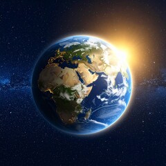 Fototapeta premium A majestic view of planet Earth from outer space showing a global sunrise