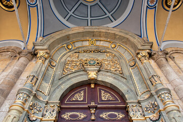 Main entrance with marble and wooden door of Aziziye mosque. Unique baroque architecture built during the 19th century Ottoman period. Konya - Turkey.