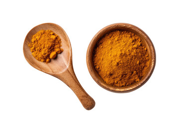 Overhead view of turmeric powder in a wooden spoon and bowl