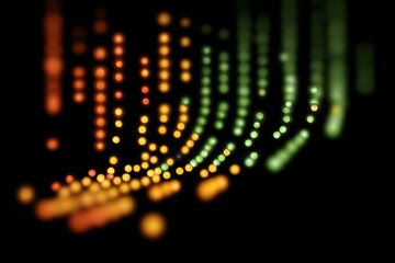 Obraz premium A series of colorful dots are arranged in a line