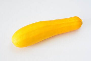 Golden Zucchini A Single, Brightly Colored Squash on White