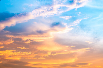 Beautiful , luxury soft gradient orange gold clouds and sunlight on the blue sky perfect for the background, take in evening,Twilight, Large size, high definition landscape photo