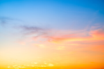 Beautiful , luxury soft gradient orange gold clouds and sunlight on the blue sky perfect for the background, take in evening,Twilight, Large size, high definition landscape photo