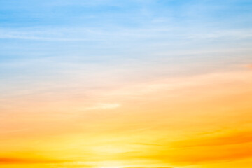 Beautiful , luxury soft gradient orange gold clouds and sunlight on the blue sky perfect for the background, take in evening,Twilight, Large size, high definition landscape photo