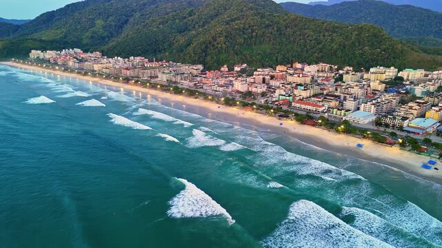 Sunset over the sea in Ubatuba Brazil Praia Grande - waves, sunrise, sun, ocean, coastline, landscape, drone, aerial