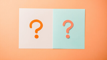 Two question marks on split background, representing choices or dilemmas. A visual concept of inquiry and decision making.