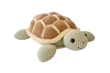 Crocheted sea turtle toy with brown shell and sage green flippers, isolated on a transparent background