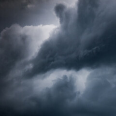 Dramatic storm cloud texture in dark blue tones