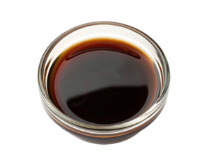 Glass bowl filled with dark soy sauce perfect for Asian cuisine and savory flavor enhancement