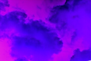 A vibrant and colorful abstract sky with fantasy clouds. A dreamy, surreal background texture for creative design projects.